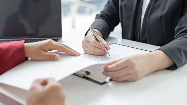 signing and explaining legal paperwork